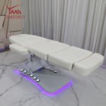 3-Motor Electric Beauty Bed Chair Angled View with Segmented Cushions and LED Base - Buy in Pakistan