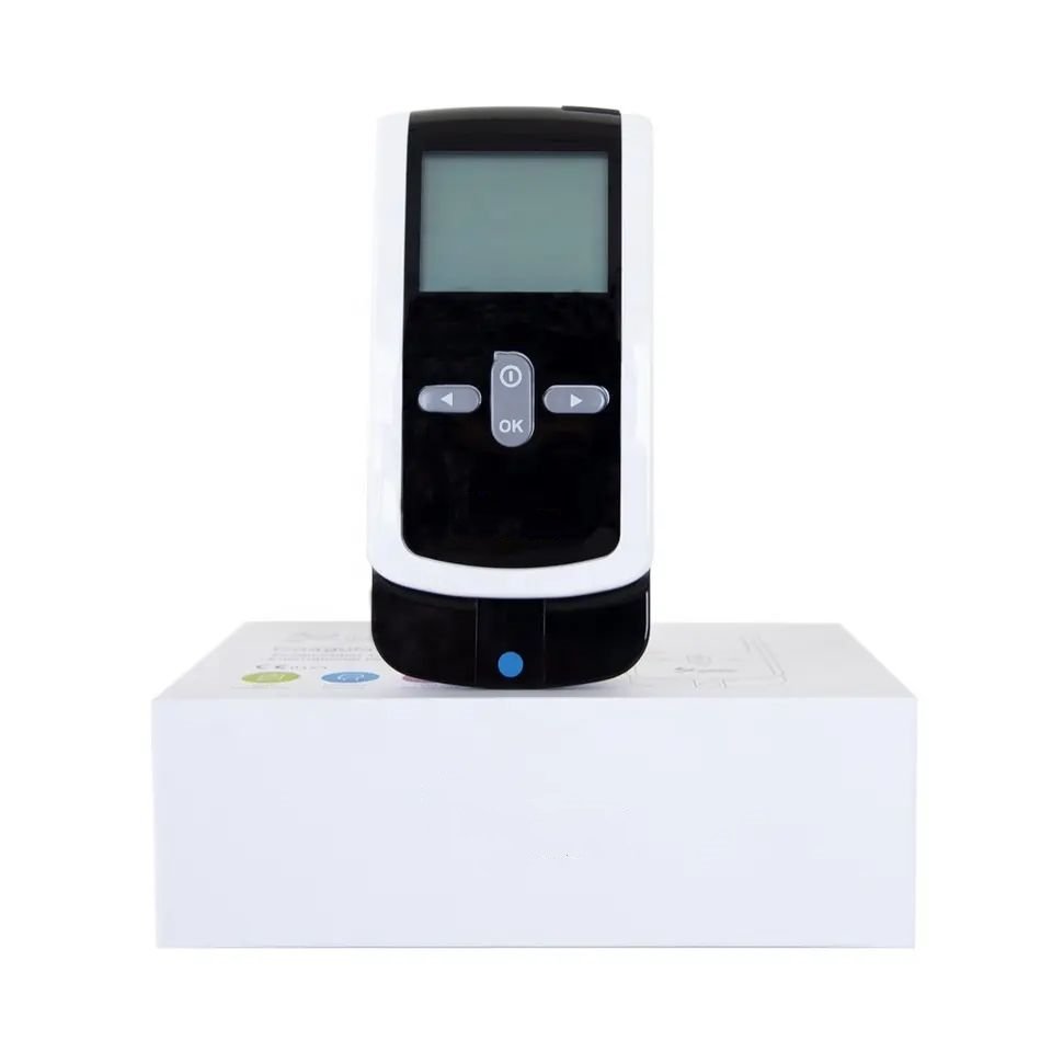 PT/INR Coagulation Analyzer – Home Use Pakistan Handheld PT INR Coagulation Analyzer standing on retail packaging box Pakistan